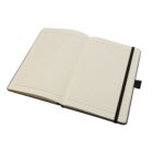 An open notebook with lined pages and a black elastic band. The pages are blank, ready for writing or drawing. The notebook has a simple, minimalistic design.