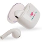 White wireless earbuds with one earbud placed outside the open charging case. The case features a logo and the words Urban Pulse FM in colorful letters. The design is sleek and compact.