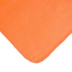 A close-up of an orange fleece fabric with neatly stitched edges, showing a corner of the material. The texture appears soft and plush.