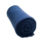 A rolled-up dark blue fleece blanket, tightly wrapped and lying on a white background.
