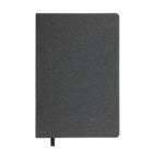 A closed black notebook with a ribbon bookmark on a white background.
