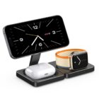 Docking station with a smartphone, wireless earbuds, and a smartwatch charging.