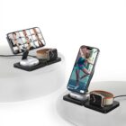 Two wireless charging stations with phones and smartwatches on them.