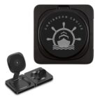Black wireless charging pad with Caribbean Cruise logo, featuring a ship and wheel icon.