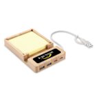 Wooden USB hub with sticky notes and a go travel label.