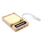 Bamboo USB hub with sticky notes holder and charging cable.