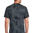 Man in tie-dye T-shirt and jeans, viewed from the back.