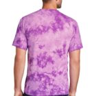 Man wearing a purple tie-dye T-shirt and jeans, facing away.