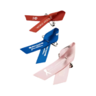 The Promotional Label Pins display three awareness ribbons: red for World AIDS Day, blue for International Day of the Disabled, and pink for Breast Cancer Month, each with relevant text and logos.