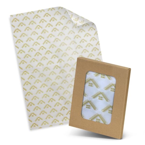 A sheet of translucent patterned paper with green geometric designs, beside a brown cardboard box with a transparent window displaying the same paper inside.