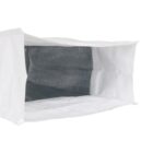 A rectangular, open-ended white tarp structure with a dark interior, resembling a makeshift shelter or storage cover. The outer material appears durable and protective.