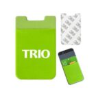 A lime green phone card holder with the word TRIO printed on it. The holder is shown from the front, back (featuring a 3M adhesive strip), and attached to a smartphone, demonstrating its use for holding cards.