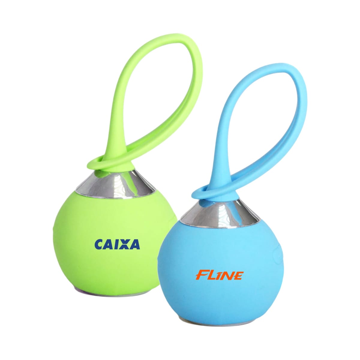 Two small, round speakers with loop handles. One is green with CAIXA in blue letters, and the other is blue with FLINE in orange letters.