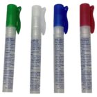 Four hand sanitizer spray pens with green, white, blue, and red caps, standing upright.