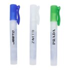 Three spray bottles with blue, white, and green caps labeled JEETO, ZAVETTI, and PRADA.