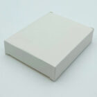 A plain, white rectangular box on a light grey background. The box is closed, with clean edges and a smooth surface.