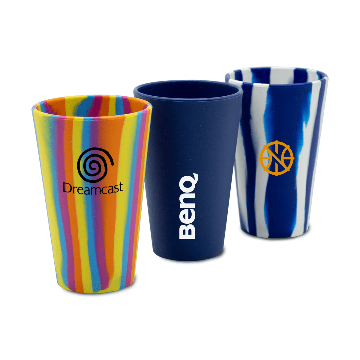 Three colorful silicone cups with different patterns and logos displayed side by side.