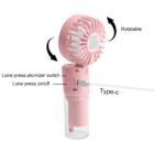A pink portable fan with a Type-C charging port. It features a rotatable head and buttons for atomizer switch and on/off functions.