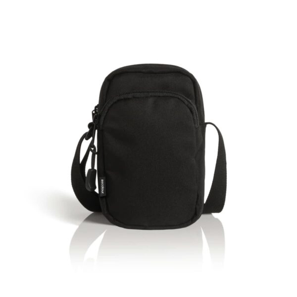 A small black crossbody bag with a sleek design. It features a central zippered compartment and an adjustable shoulder strap. The bag is displayed against a plain white background, casting a slight shadow.