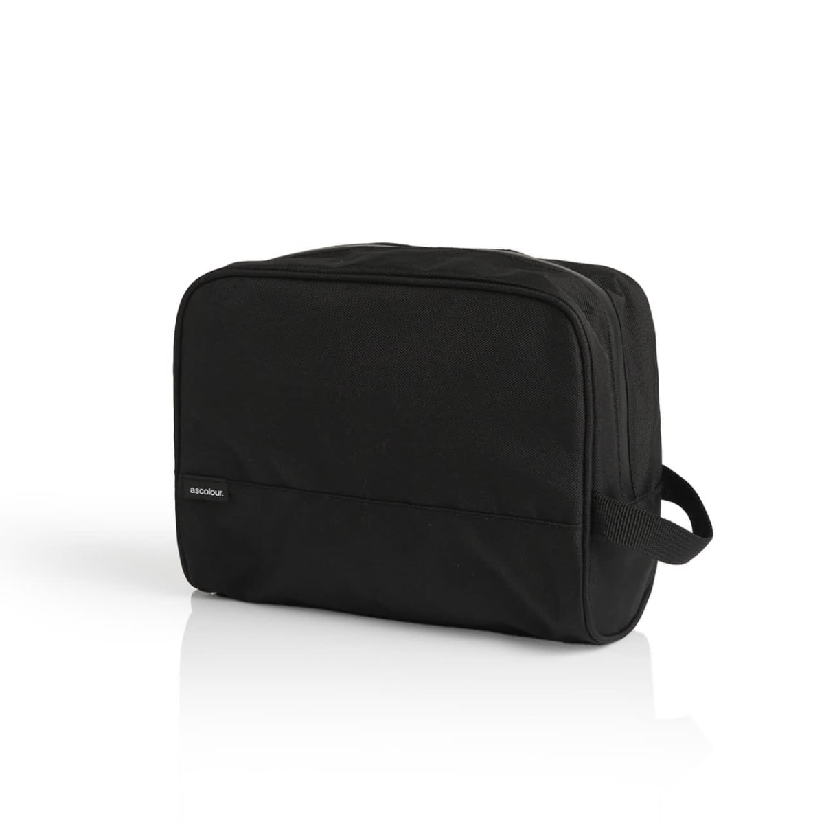 A black toiletry bag with a rectangular shape against a white background. It features a small handle on one side and a front pocket with a subtle logo tag.