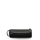 A black cylindrical pencil case with a zipper closure is positioned against a white background. It has a small handle on one end and a brand tag near the zipper.