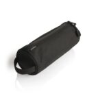 A black cylindrical pencil case with a zipper closure and a small top handle, placed on a white surface. The material appears to be durable fabric, and the brand name is subtly printed on the side.