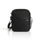 A black crossbody bag with a front zipper pocket and adjustable shoulder strap. The bag is rectangular and features a subtle logo label on the front. It is positioned upright against a white background, casting a slight shadow.