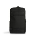 A sleek black backpack with a minimalist design, featuring a front zippered pocket, two horizontal straps with buckles, and a top handle. The backpack has a smooth texture and a rectangular shape.