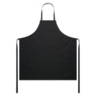 Black apron displayed flat against a white background. The apron features a neck loop and two long side ties, with a large front pocket in the center.