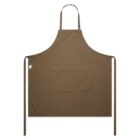 A brown apron with a neck strap and waist ties is displayed. The apron features a large central pocket and has a simple, functional design. The fabric appears sturdy and suitable for kitchen or workshop use.