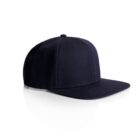 A navy blue baseball cap with a flat brim, viewed at an angle. The cap is displayed on a white reflective surface, highlighting its simple, classic design.