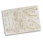Laser-cut wooden sheet with various pre-cut pieces for assembly. The pieces include outlines for a model with tracks, mechanical arms, and rectangular components. Each part is numbered for easy identification. Background is white.