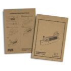 Two brown cardboard packages for a wooden model cargo ship. One shows assembly instructions with diagrams, and the other displays an illustration of the completed ship.