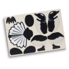 A wooden puzzle with nine pieces depicting black and white bird parts, including wings, heads, tails, and body pieces. The pieces are arranged on a light-colored board.