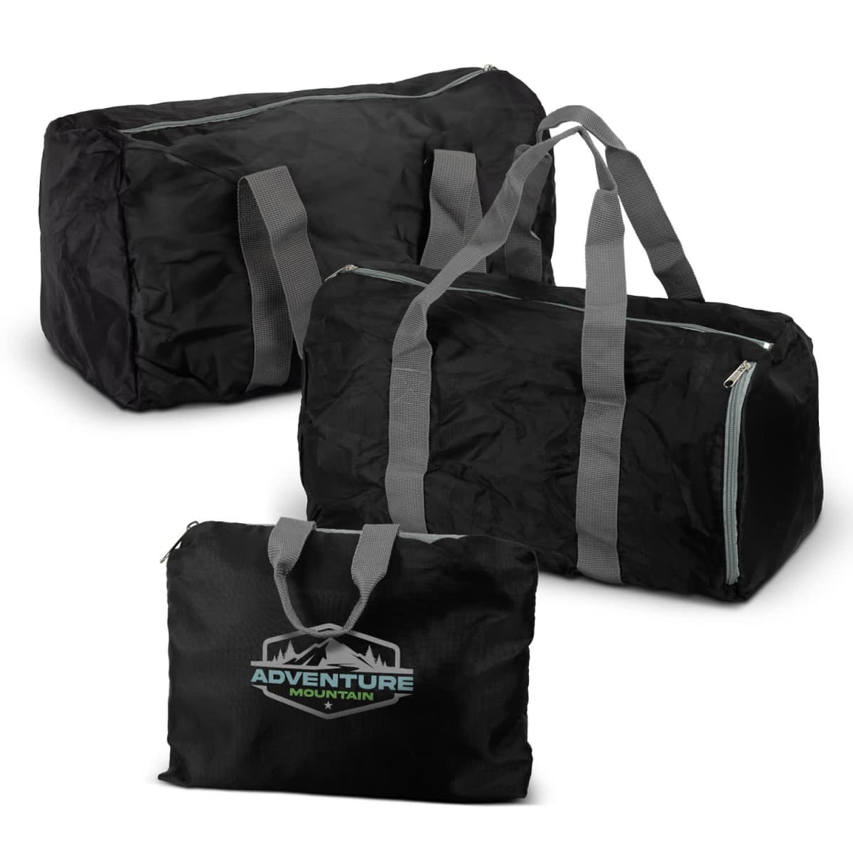 Three black duffel bags of varying sizes are pictured. Each bag features gray handles and zippers, with one bag displaying the Adventure Mountain logo. The bags are positioned against a white background.