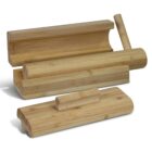 Wooden sushi rolling molds and presses, made from light-colored wood, are arranged on a white background. They include cylindrical molds and rectangular blocks with grooves for shaping sushi rice.