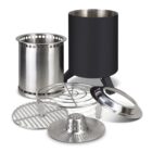 A stainless steel outdoor portable stove with multiple detachable parts, including a grill grate and a round base. The components are arranged separately, showcasing the assembly of the stove.