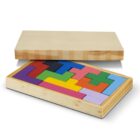 A wooden box with colorful Tetris-like puzzle pieces inside and a partially open lid.