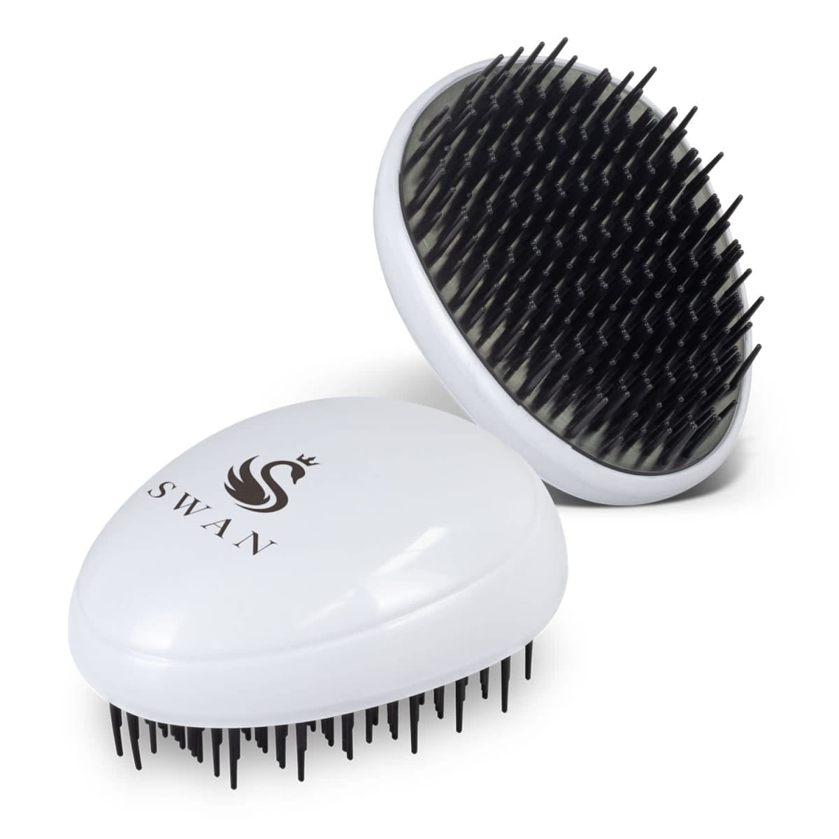 Two white oval hairbrushes with black bristles. One brush is resting on its bristles, showing the Swan logo on the back, featuring an elegant stylized swan with a crown. The other brush is upright, displaying its bristles.