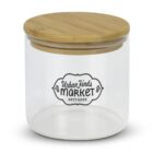 Clear glass jar with a wooden lid featuring the logo Urban Finds Market Antiques on the front. The jar is empty and displayed against a white background.