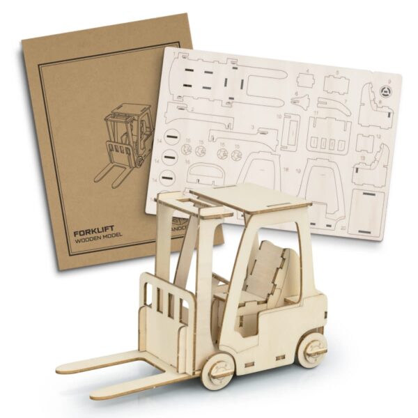 Wooden forklift model kit featuring assembled forklift and unassembled die-cut sheets with parts laid out. Instruction booklet shown in the background.