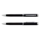 Two black ballpoint pens with silver accents. The top pen is closed, showing its clip and sleek design. The bottom pen has its tip extended, ready for writing. Both are horizontally aligned on a white background.