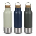 Three stainless steel water bottles with cork lids and metal handles are lined up. The bottles are colored: light green, navy blue, and dark green. The bottom portion of each bottle is silver.