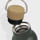 A green insulated bottle with a metal interior is shown with its cork and metal handle lid lifted just above. The image highlights the screw-top design and materials used for the bottle and lid.
