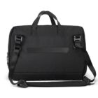 A black laptop bag with two handles and an adjustable shoulder strap, designed for convenience and mobility. The bag has a sleek, minimalist design and a small front pocket for extra storage.