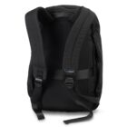 A black backpack with padded shoulder straps, seen from the back. It features adjustable straps and a top handle, designed for comfort and convenience. The material appears durable, suitable for everyday use or travel.