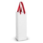 A tall, plain white gift bag with red handles, designed for a wine bottle or similar item, stands upright against a white background.