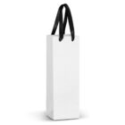 A tall, white paper gift bag with black handles, shown against a plain white background. The bag is designed for carrying items like bottles or other narrow objects.