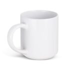 A plain white ceramic mug with a smooth finish, viewed from a slight angle to show the handle on the left side. The mug is empty and sits on a white background.
