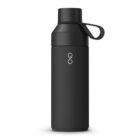 A sleek, black thermos bottle with a detachable lid and a loop handle. It features a minimalist logo in white near the top. The design is smooth and cylindrical, ideal for hot or cold beverages.